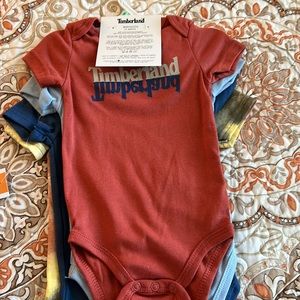 Set of 4 Boy Baby onsies. Size 18. New
